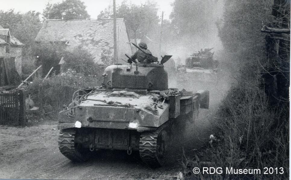 M4 Shermans of the 4th/7th Royal Dragoon Guards in action, France, 1944.